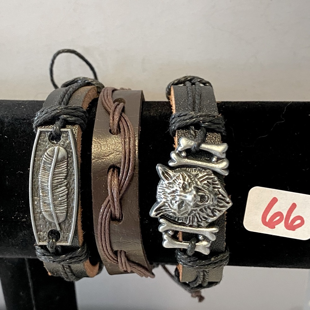 Three pc leather braclet set. As shown